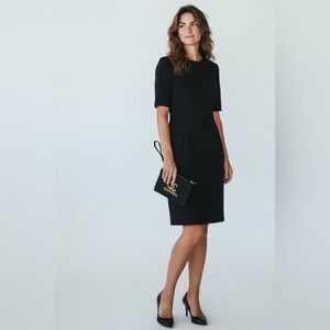 Black canvas Wristlet with golden logo